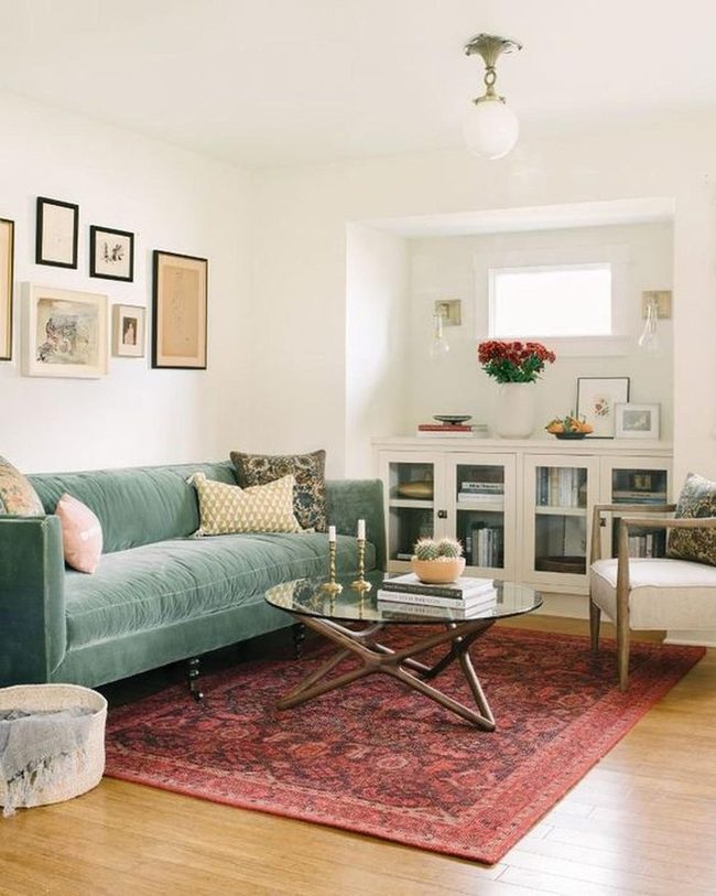 Green Velvet Sofas With Scarlet Rug