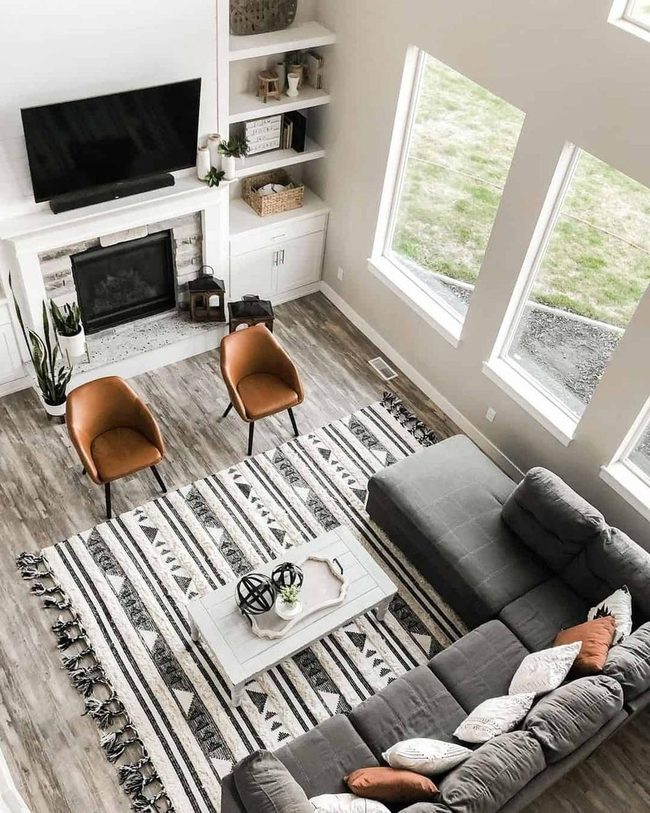 Gray L-Shaped Sectional With Pattern Rug