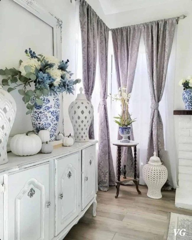 Blue-Patterned Drapes With White Foundation