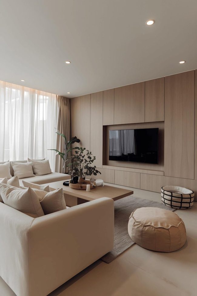 Beige Sofa With Warm Neutral Wood Wall Contrast