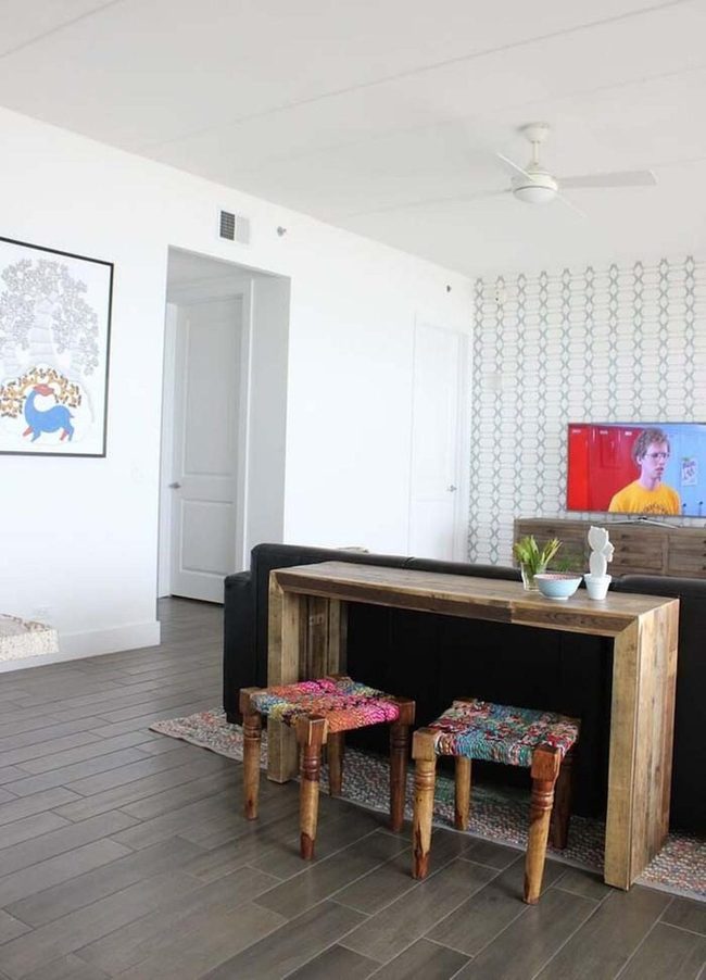 Reclaimed Wood Table Hides Extra Seating