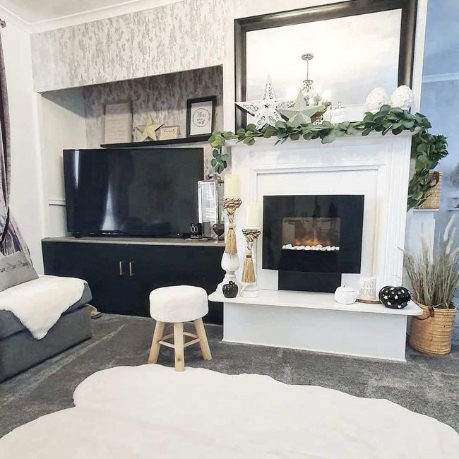Layered White And Gray Rugs