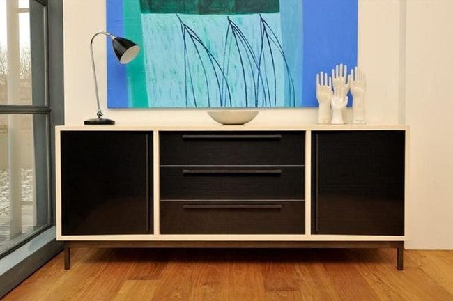 Pale Wood Sideboard Anchors Modern Contrast