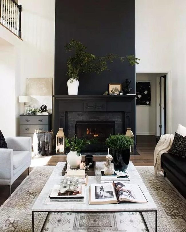 Black Fireplace, Green Plants, Neutral Palette