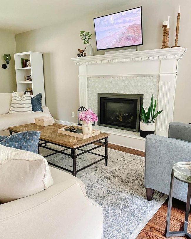 White Fireplace Anchors Cream Living Room