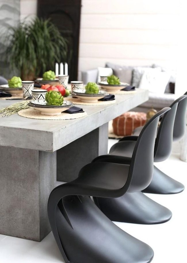 Black Concrete Dining With Green Accents