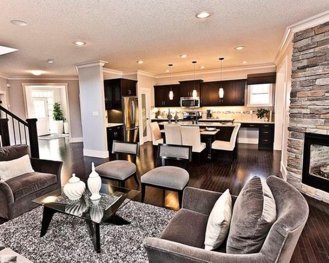 Stone Fireplace Anchors Open Living Space