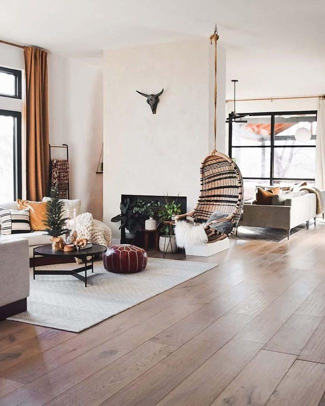 Striped Hanging Chairs By Fireplace