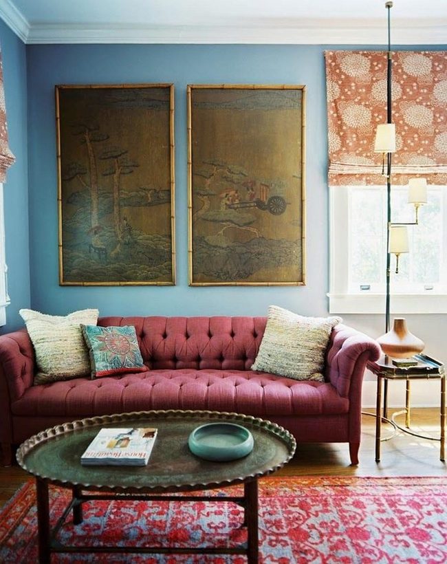 Bright Blue Walls And Deep Red Sofa