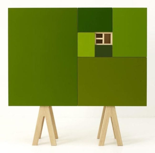 Green Patterned Cabinet With Wooden Legs