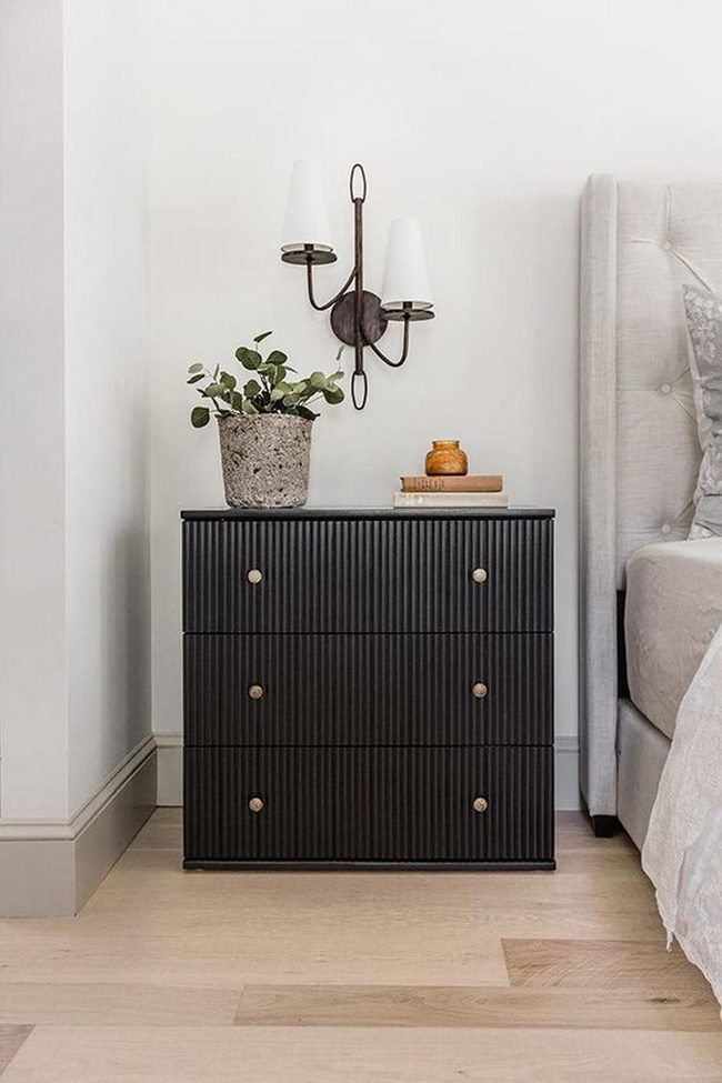 Black Dresser With Warm Accents
