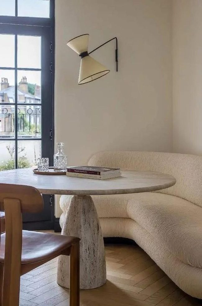 Curved Sofa Frames Intimate Dining Nook