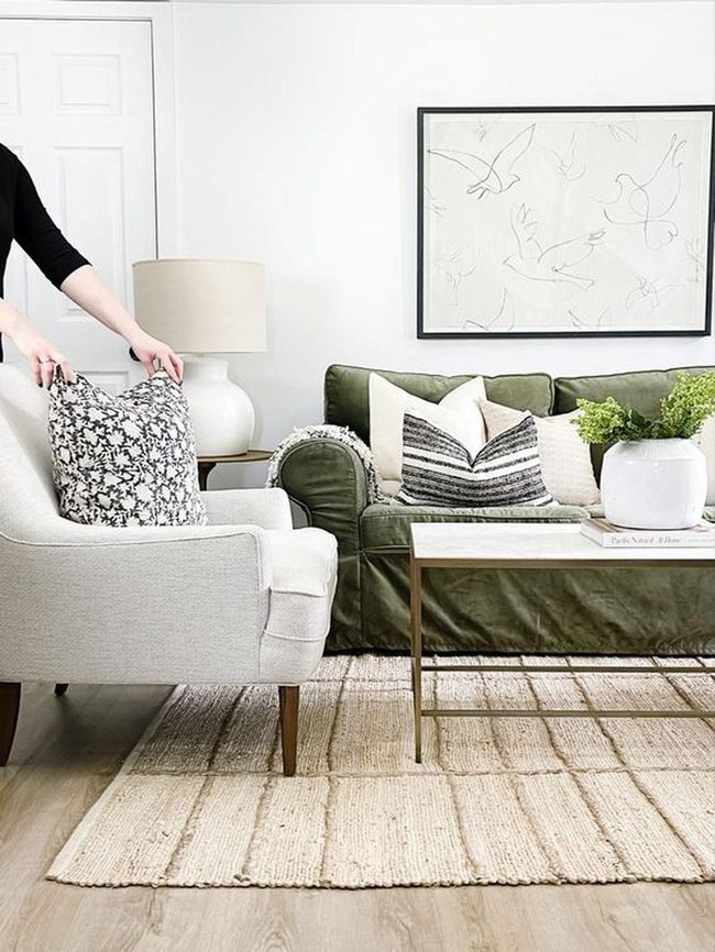 Deep Green Sofa With Bird Art