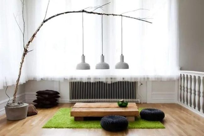 White Pendant Lights Over Wooden Table