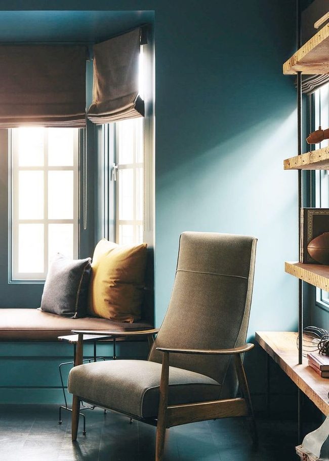 Deep Blue-Green Walls With Earthy Accents
