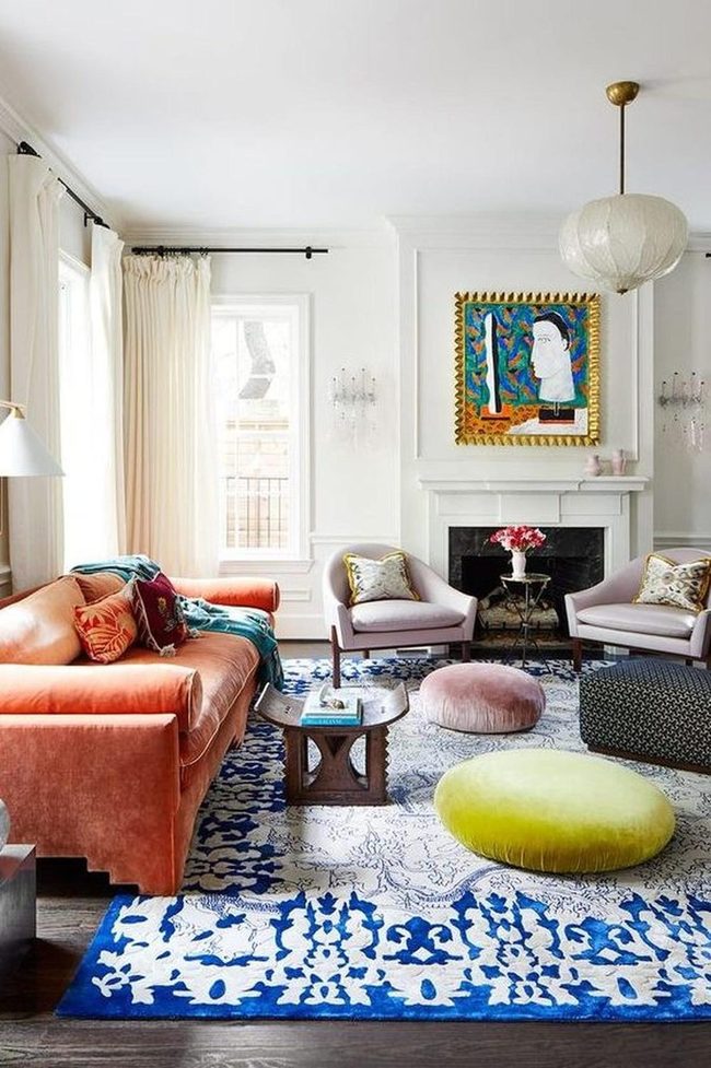 Gold-Framed Art Above Fireplace