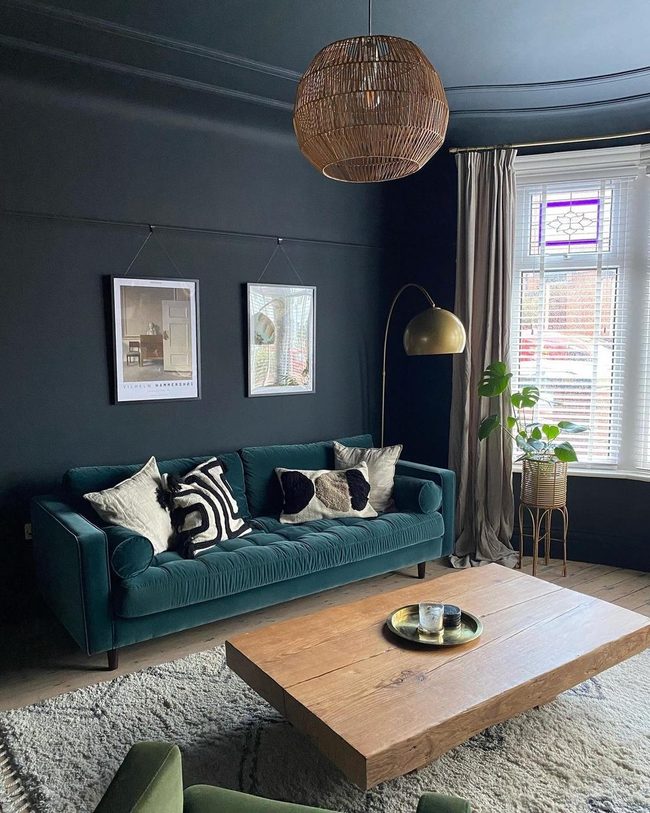 Teal Sofa Against Moody Walls