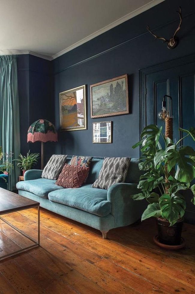 Dark Blue Walls Green Velvet Sofa