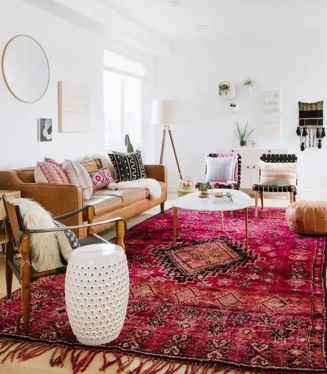 Red Geometric Rug Anchors Living Room