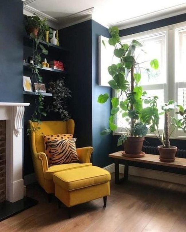 Sunny Yellow Chair Against Deep Blue Walls