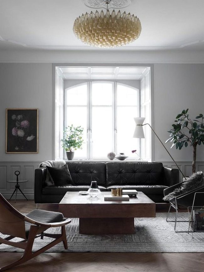 Black Leather Sofa Meets Calm Gray