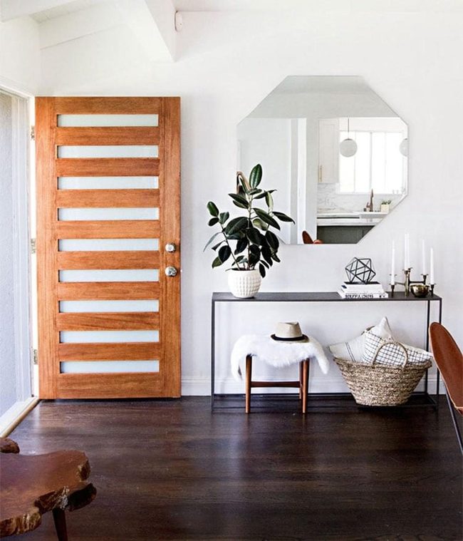 Frameless Mirror Expands Narrow Entryways