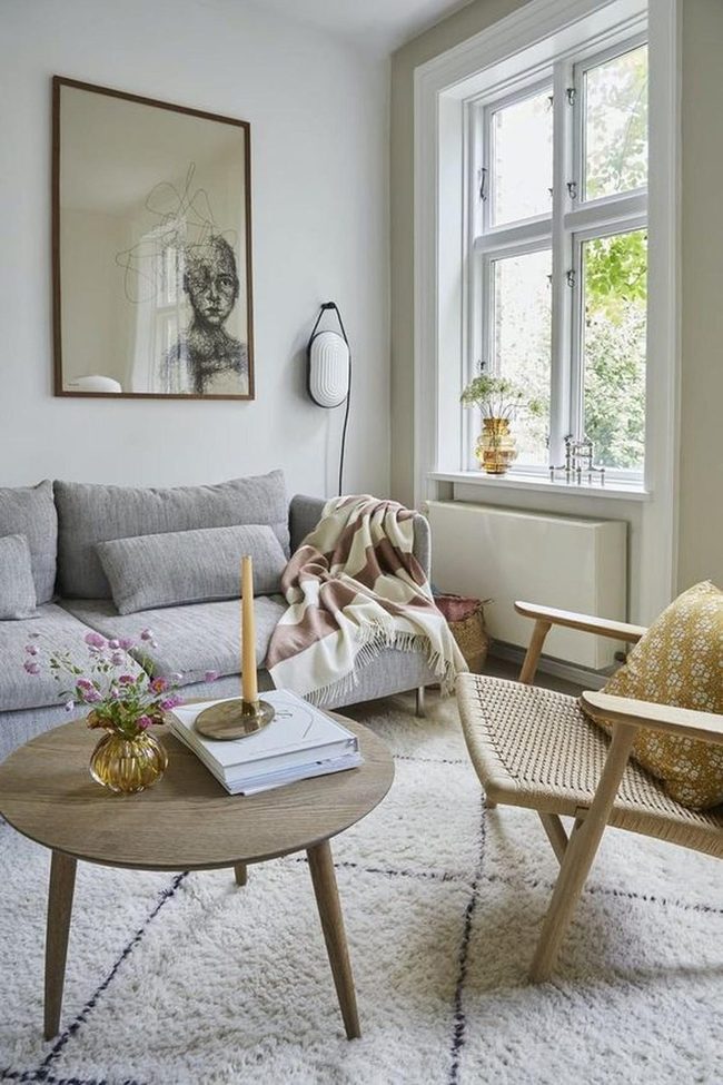 Sunlit Gray Room With Natural Wood