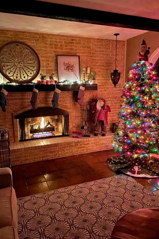 Brick Fireplace With Festive String Lights