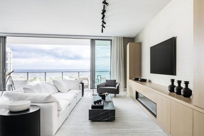 Minimal Cabinet Opens Living Room
