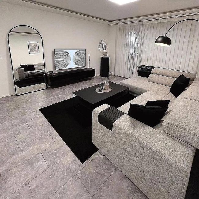 Curved Mirror Expands Modern Spaces