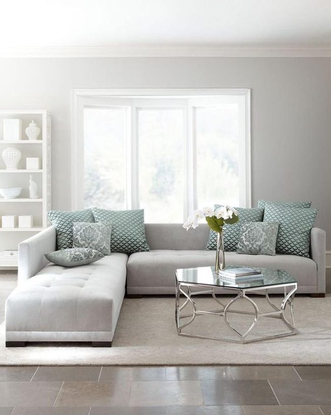 Sunlit Gray Living Room With Teal Accents