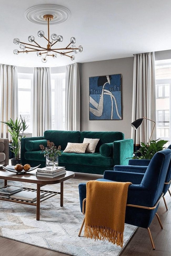 Green Velvet Sofa With Glass Pendant Lights