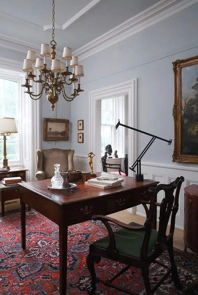 Blue Walls With Red Patterned Rug