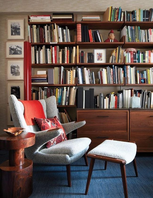 Red Accents In Gray Reading Corner