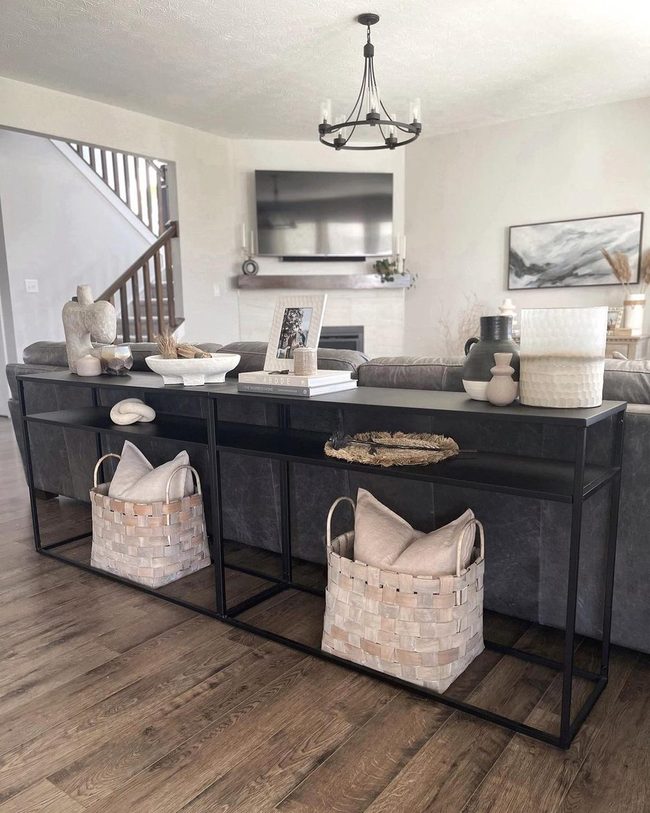 Black Frames, Textured Walls, Neutral Sophistication