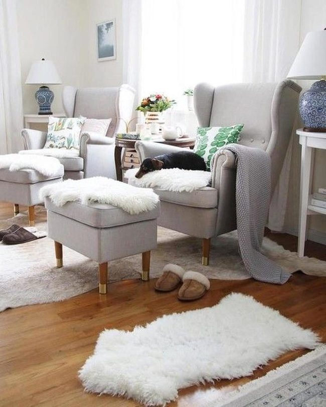 Light Gray Chairs, Green Pillows, Gleaming Wood