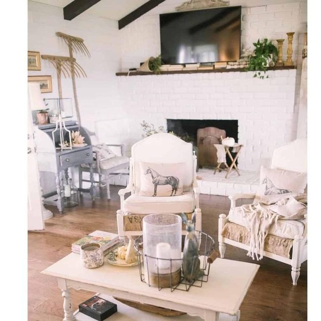 White Brick Fireplace With Television Focal Point