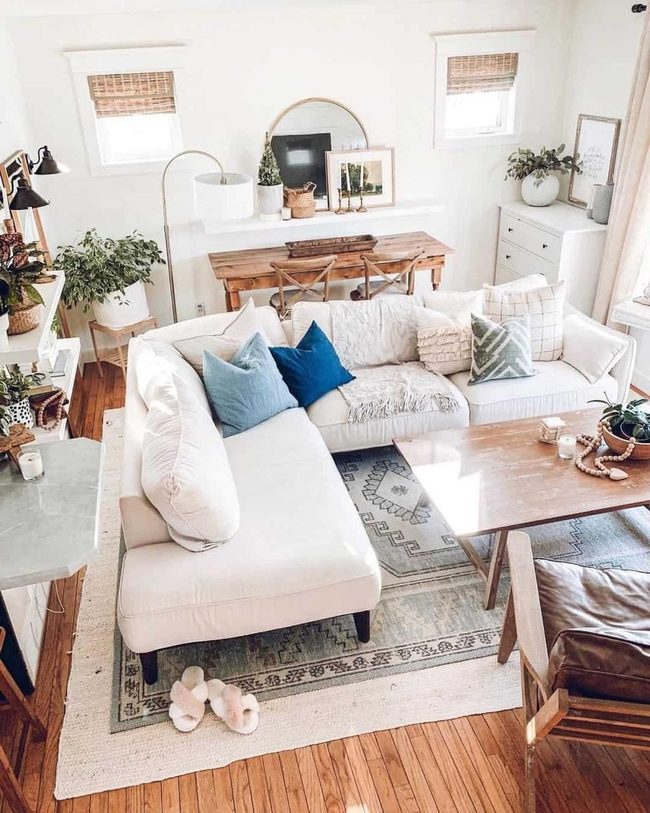 White Corner Couch With Blue Accents