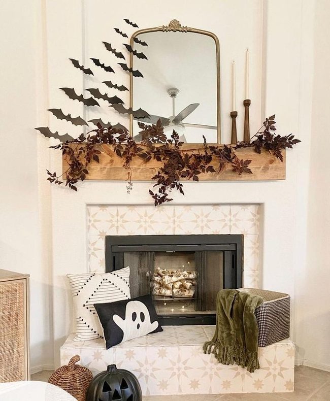 Spooky Mantel With Gold Mirrors
