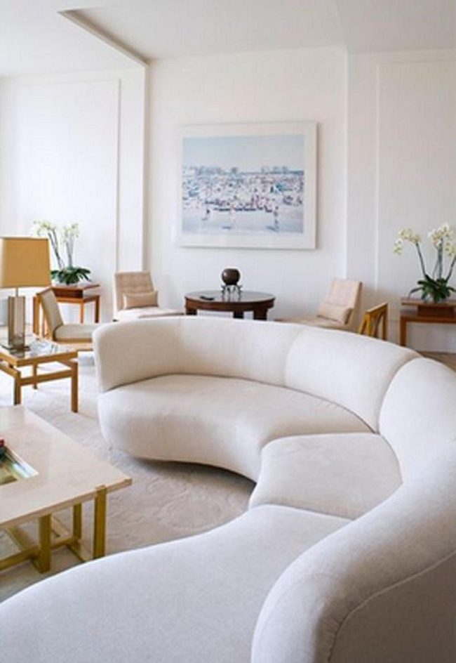 Curved White Sofa With Green Florals