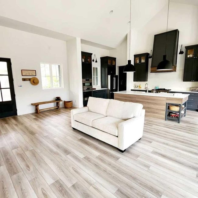White Vaulted Ceilings Black Pendant Contrast