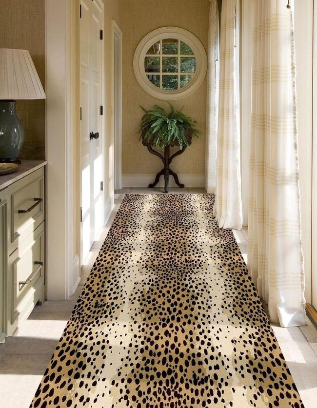 Sunlit Hallway With Spotted Runners