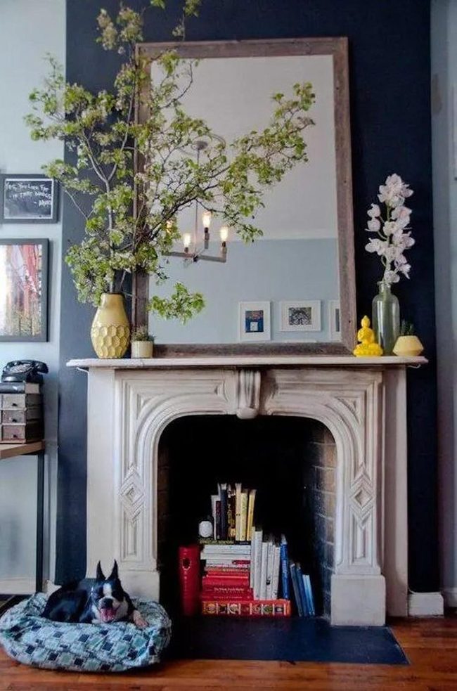Stone Fireplace With Yellow Branches
