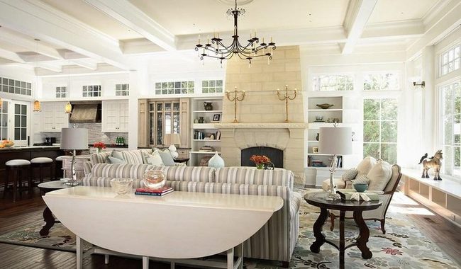 Black Chandelier Anchors Striped Living Room