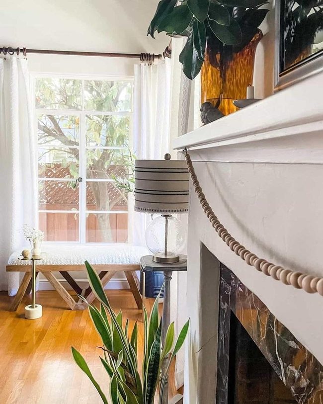 White Mantel With Natural Wood Accents