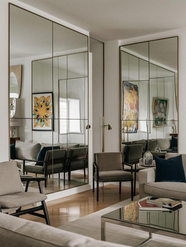 Reflective Surfaces Expand Small Spaces