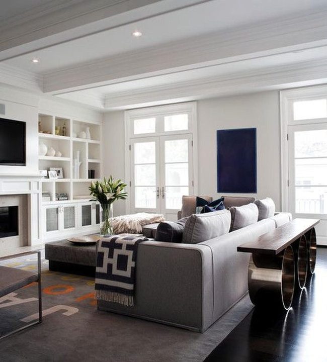 Gray Sofa, White Walls, Blue Art