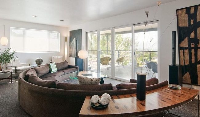 Brown Curved Sofa, Sunlit Serenity