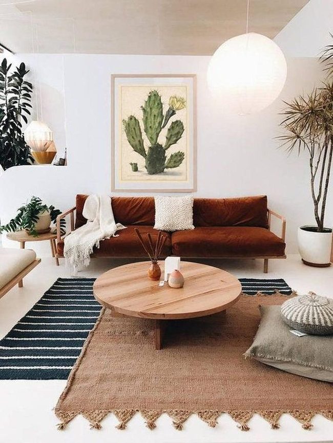Brown Sofa With Green Cactus Art