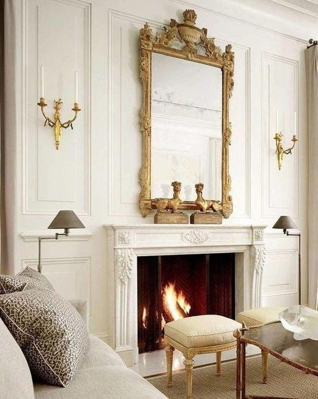 Gold Mirror Above White Fireplace